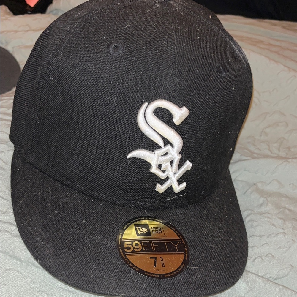 New Era Black Cap with White Embroidery